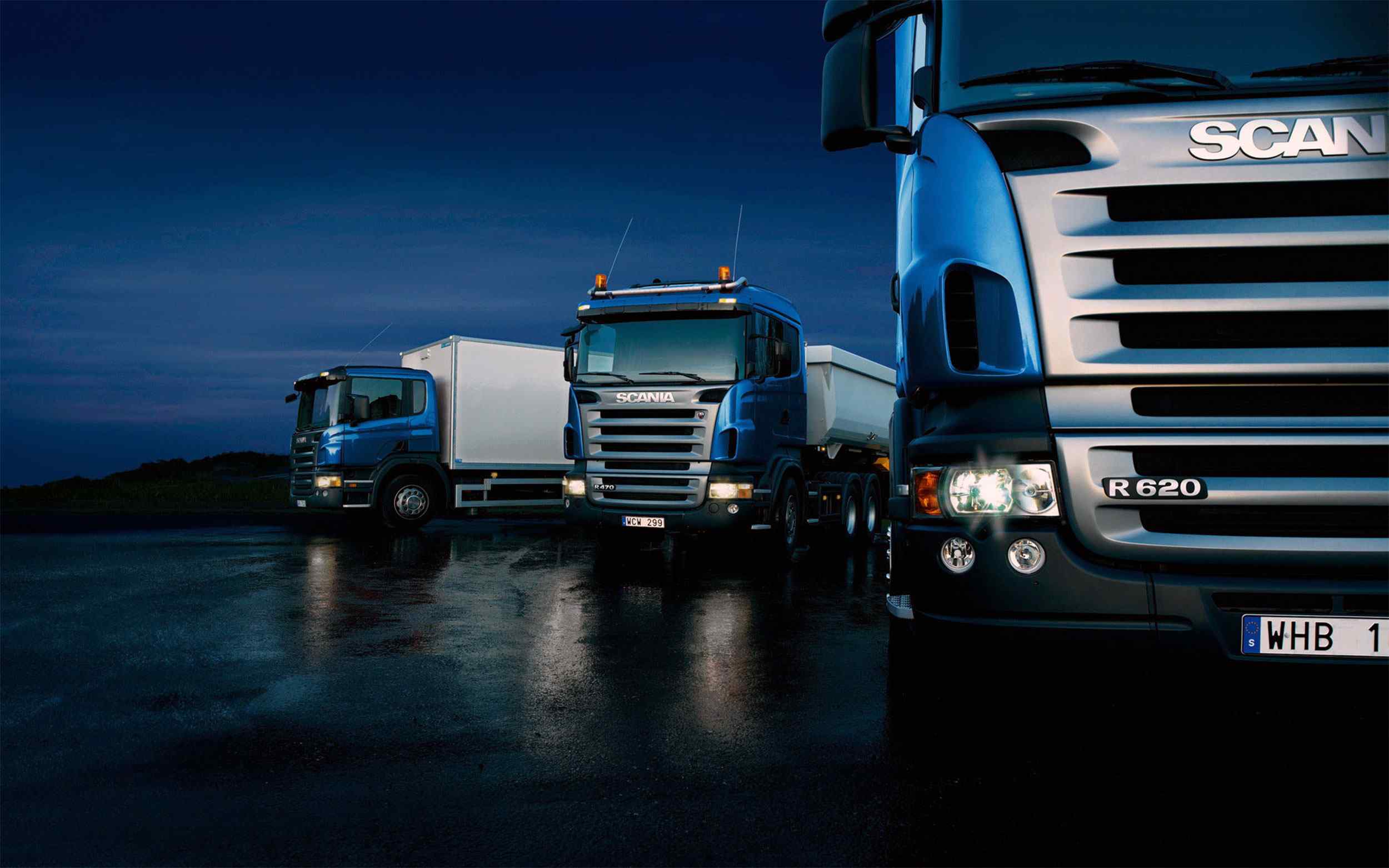 Three-trucks-on-blue-background-35.jpg